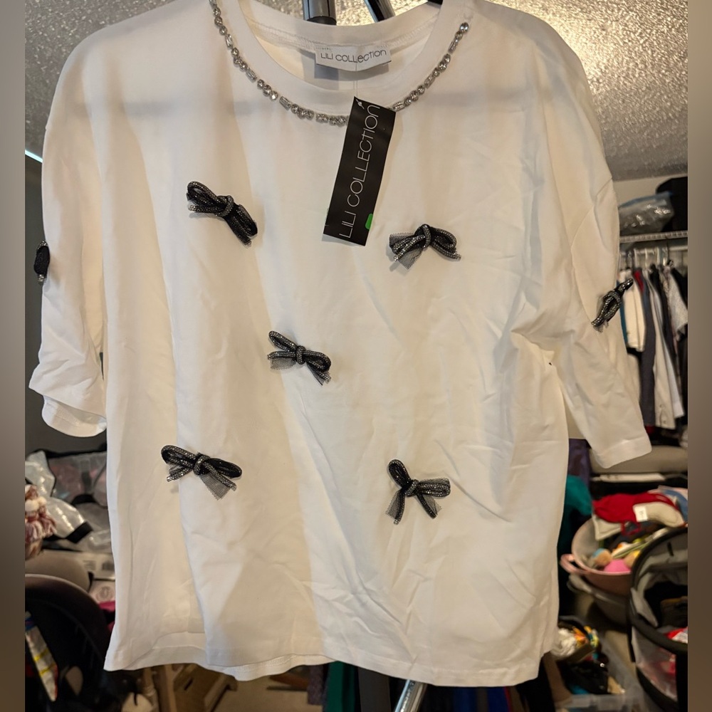 NWT White Crop Top with Black Bow Accents. Size XL/ 1XL.